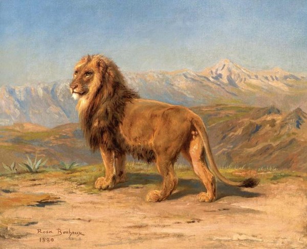 LION IN A MOUNTAINOUS LANDSCAPE