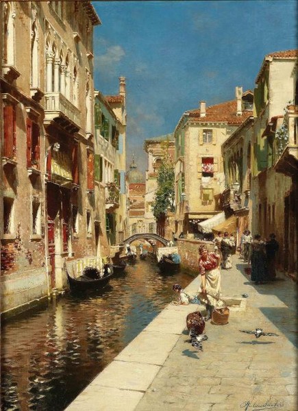 Women walking beside a Venetian canal