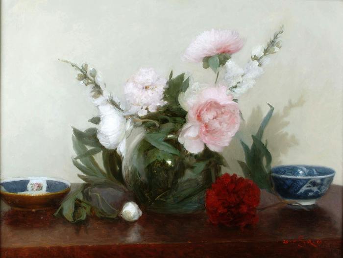 Peonies in a glass vase